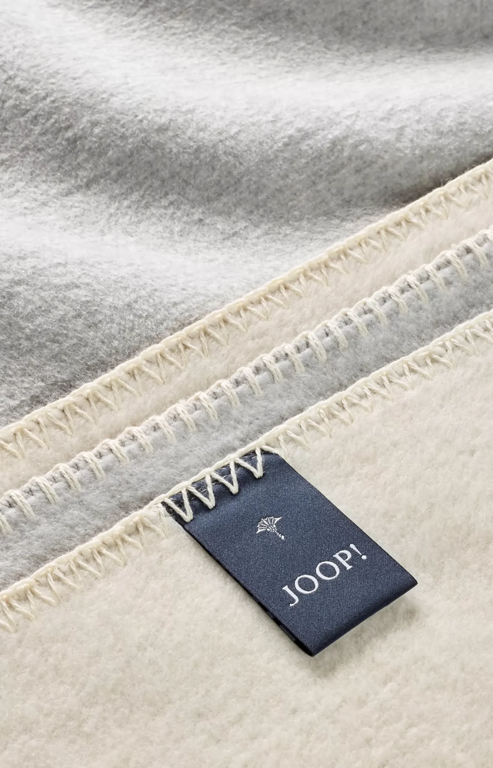 JOOP! MELANGE DOUBLEFACE throw in stone/silver