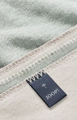 JOOP! MELANGE-DOUBLEFACE throw in jade/nature