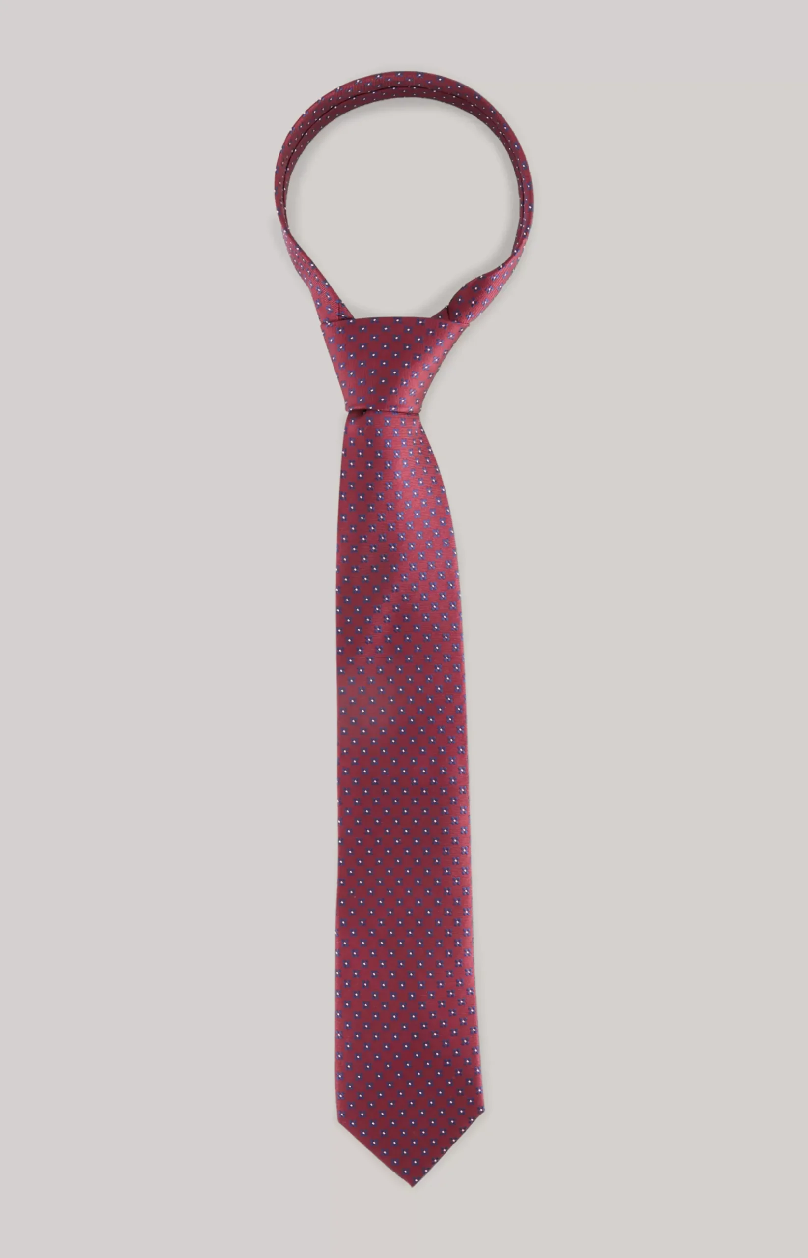 Silk tie in a dark red pattern