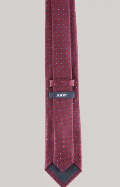 Silk tie in a dark red pattern