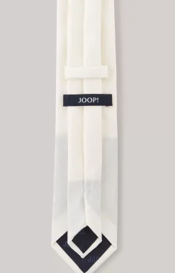 Tie in light beige