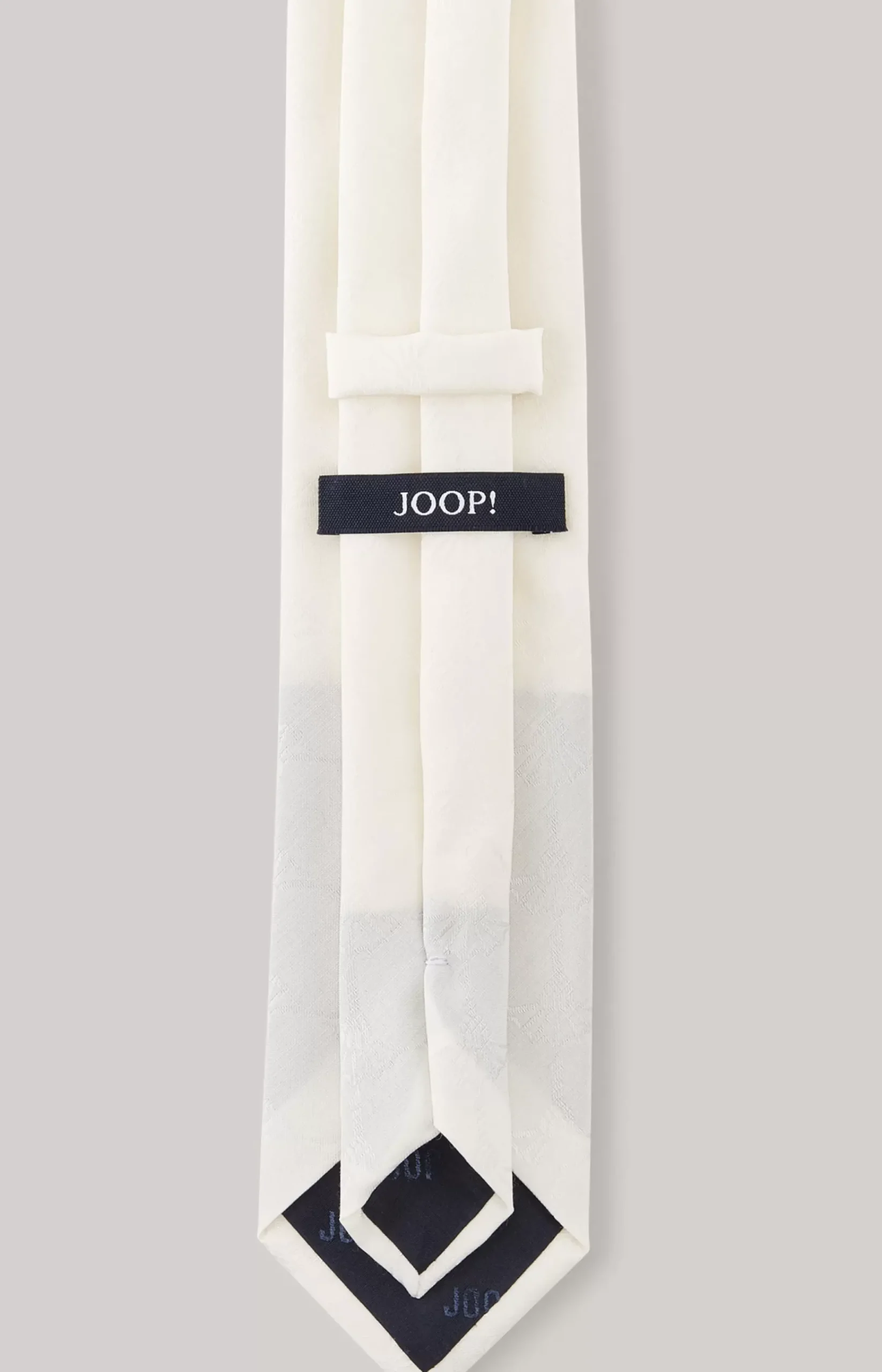 Tie in light beige